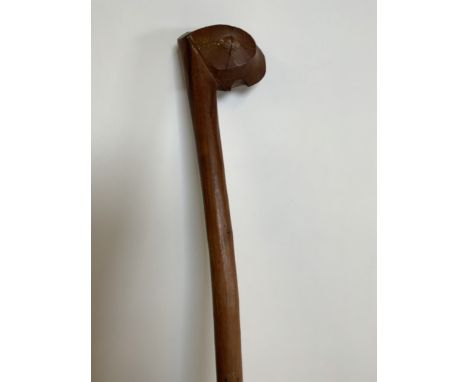 An adze carved hardwood early knob stick.  Length 100cm. 