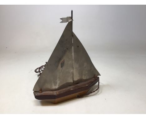 An Art Deco lamp styled as a yacht with wooden base and metal sailsW:28cm x H:32cm