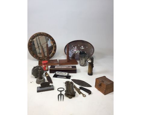 A good selection of collectibles: a mother of pearl inlaid tray, a USAlite torch, desk weights, a brass letter box, a Johanne