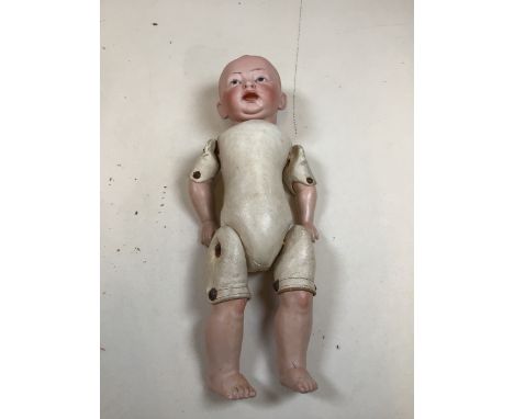 A bisque head doll with bisque arms and legs and kid leather body. Impressed 142 to back of head, indistinct blue print to ba