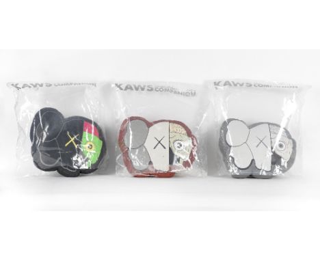 KAWS (American, born 1974)Dissected Companions (Black, Red &amp; Grey) Three polyester plushes, 2008, produced by Medicom Toy