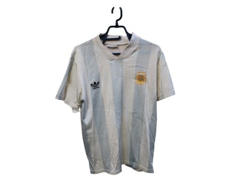 DIEGO MARADONA 1993/94 MATCH WORN #10 ARGENTINA JERSEY WITH MATCH WORN CAPTAIN ARMBAND Presented is an Argentina National Tea