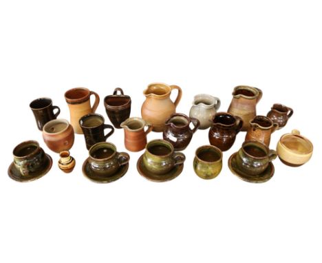 Good collection of Studio Pottery to include Winchcombe Pottery and John Leach Pottery Ewers, Mugs and and jars. (20)
