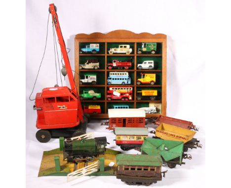 Collection of Hornby O gauge tinplate model railways, K & L Steelfounders & Engineers Ltd crane and a small wall cabinet of C