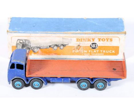Dinky Supertoys 503 Foden flat truck with tailboard with deep blue cab, dull orange flatbed and light blue hubs, boxed