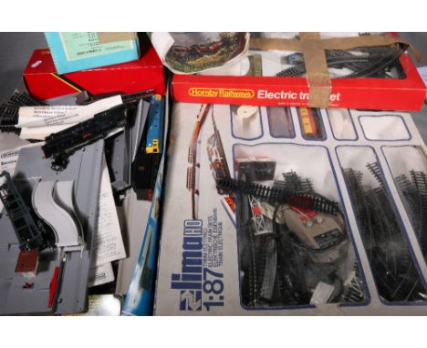 Three OO gauge part train sets including Lima and Hornby, accessories, etc
