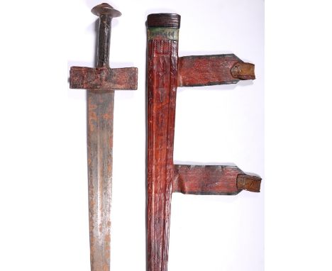 19th century broadsword possibly Morrocan having wide flat triangular blade, the grip bound in leather complete with tooled l