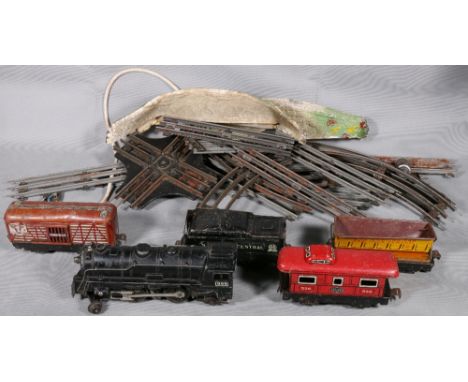 USA made pressed steel 2-4-2 locomotive, Marlines tender, three wagons and various trunk