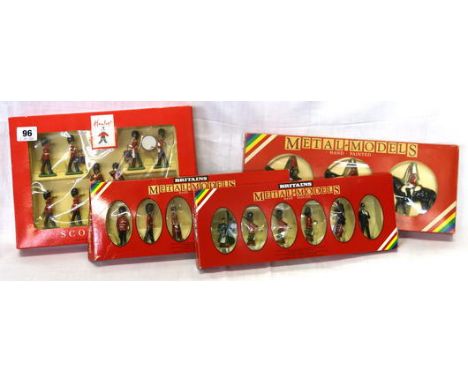 Britains metal models soldiers sets including Scots Guards 10 piece band 7233, Her Majesty Queen Elizabeth mounted lifeguard 