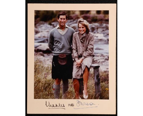 Royal Portrait photograph
of HRH Prince Charles and Princess Diana, beside the river at Balmoral wearing kilt and country att