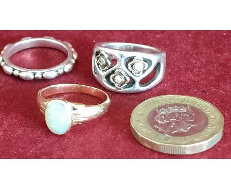 TWO SILVER RINGS AND GOLD COLOURED RING WITH CENTRAL OPAL, TOTAL WEIGHT APPROXIMATELY 13.7g 