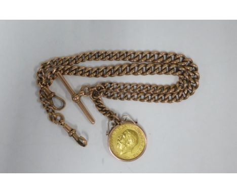 George V 1911 gold full sovereign in a 9ct gold mount on a 9ct gold Albert watch chain 