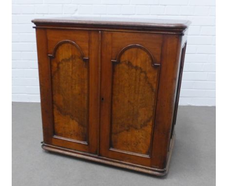 19th century mahogany and burrwood two door cupboard, the interior with four short drawers and a shelf, on a plinth base. 75 