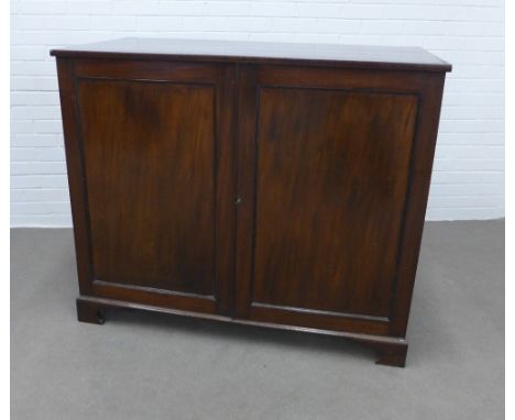 Mahogany two door cupboard, with a set of twelve drawers to the interior, on ogee bracket feet, 106 x 105 x 64cm 