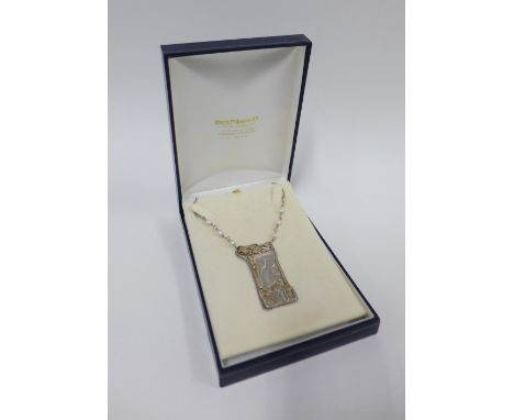 Sheana M. Stephen (Scottish)  silver and parcel gilt  pendant plaque on a silver chain interspaced with freshwater pearls, Ed