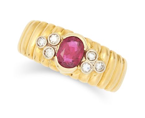 RUBY AND DIAMOND RING set with an oval cut ruby and round cut diamonds, size J / 4.5, 3.9g.