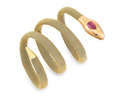 RUBY AND DIAMOND SNAKE BANGLE set with a pear cut ruby and rose cut diamonds, 32.7g.