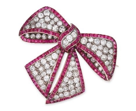 ANTIQUE DIAMOND AND RUBY BOW BROOCH, CIRCA 1900 set with old cut diamonds and step cut rubies, 4cm, 11.4g.