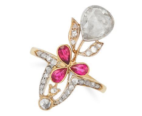 ANTIQUE DIAMOND AND RUBY RING set with a central rose cut diamond of approximately 1.10 carats with further rose cut diamonds