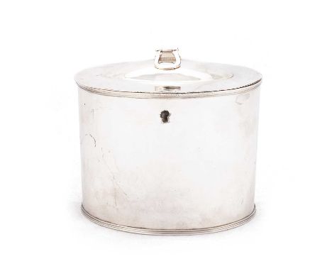 A GEORGE III OLD SHEFFIELD PLATE TEA CADDY plain oval form, with reeded borders. 13cm wide
