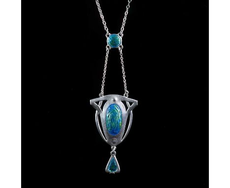 CHARLES HORNER: AN ART NOUVEAU SILVER AND ENAMEL PENDANT NECKLACE by Charles Horner, Chester 1912, the pendant of oval-shape 