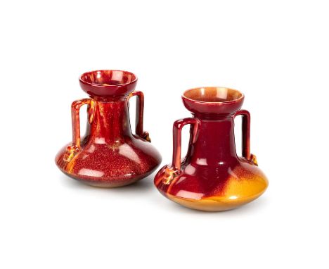 CHRISTOPHER DRESSER (1868-1904) FOR LINTHORPE ART POTTERY, A PAIR OF TWO-HANDLED VASES, CIRCA 1880 each decorated in a red an