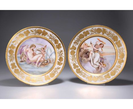 A PAIR OF PARIS PORCELAIN PLATES, 19TH CENTURY each painted a Classical maiden and putti, embellished with gilding. (2) 23cm 