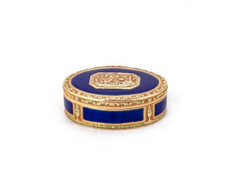 A LATE 18TH CENTURY GOLD AND ENAMEL OVAL BOX the hinged cover centred by a cut-cornered rectangular panel depicting a dog, bi