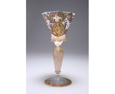 A VENETIAN MURANO GLASS GOBLET the opalescent octagonal tapering bowl enamel painted with scrolls and trellis, raised on a wr