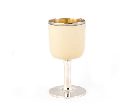 GERALD BENNEY: AN ELIZABETH II SILVER AND ENAMEL GOBLET by Gerald Benney, London 1971, the bowl decorated with cream enamel, 