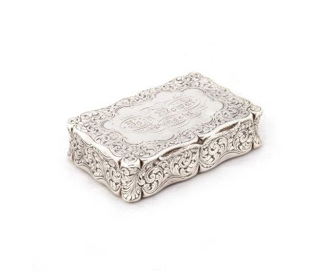 A LARGE VICTORIAN SILVER TABLE SNUFF BOX by Edward Smith, Birmingham 1850, shaped rectangular form with hinged cover, engrave