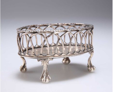 A LARGE GEORGE III SILVER SALT by Paul Storr, marks indistinct, oval, with gadrooned rim and wirework sides, the base engrave