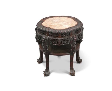 A 19TH CENTURY CHINESE MARBLE AND HARDWOOD JARDINIÈRE STAND of large proportions, the lobed circular top with foliate carved 