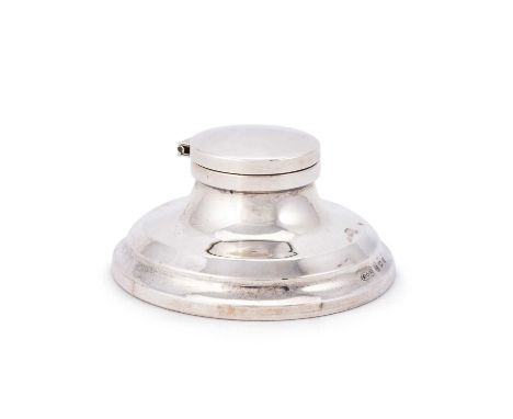 A GEORGE V SILVER CAPSTAN INKWELL by J Beach &amp; Co, Birmingham 1921, of typical form, weighted. 8cm diameter