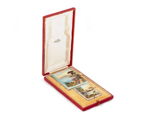 A GEORGE V SILVER AND ENAMEL CIGARETTE AND VESTA CASE SET by John Collard Vickery, Birmingham 1932, each of rectangular form,