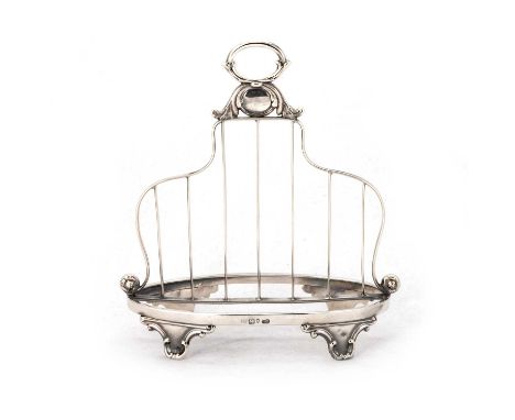 A VICTORIAN SILVER TOAST RACK by Henry Wilkinson &amp; Co, Sheffield 1841, the oval stand supporting a scroll-form centre sup