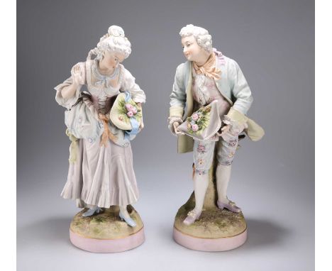 A LARGE PAIR OF CONTINENTAL BISQUE PORCELAIN FIGURES, CIRCA 1900 modelled as a lady and gentleman in 18th Century dress, unma