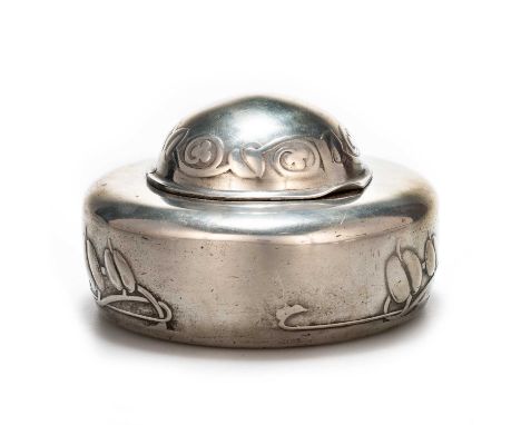 ARCHIBALD KNOX (1864-1933) FOR LIBERTY & CO, A TUDRIC PEWTER INKWELL no. 0162, of circular form with hinged domed cover, cast