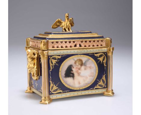 A CONTINENTAL PORCELAIN CASKET, LATE 19TH CENTURY rectangular, the pull-off cover with a reticulated border, painted to the f