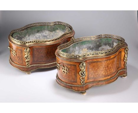 A PAIR OF NAPOLEON III GILT-METAL MOUNTED AND INLAID KINGWOOD JARDINIÈRES of shaped oval form, each with a pierced gallery an