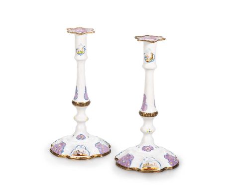 A PAIR OF SOUTH STAFFORDSHIRE ENAMEL CANDLESTICKS, CIRCA 1770 each with a shaped drip pan above a slender stem with a gilt-me