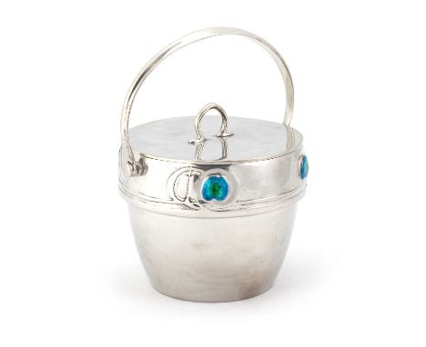 ARCHIBALD KNOX (1864-1933) FOR LIBERTY & CO, A TUDRIC PEWTER AND ENAMEL BISCUIT BOX AND COVER no. 01166, with a swing-handle,