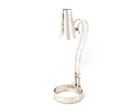 A CARTIER ART DECO STERLING SILVER WINE BOTTLE HOLDER stamped CARTIER STERLING 925-1000, with hinged twin-handles and collar,