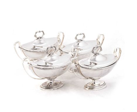 A SET OF FOUR GEORGE III SILVER SAUCE TUREENS AND COVERS by Paul Storr, London 1797, each oval with twin-handles, the lift-of