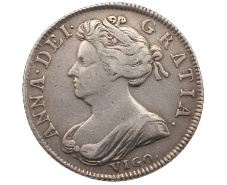 1702 Queen Anne pre-union silver Shilling with 'VIGO' mintmark (S 3585, Bull 1387, ESC 1130). Obverse: left-facing draped bus