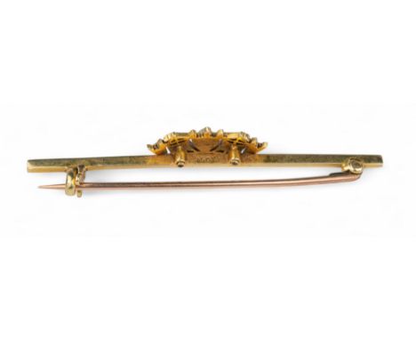 British Edwardian A 15 carat gold enamel and split pearl coronet bar brooch  Weight: Approx. 3.49 grams Dimensions: 5.1 cm. (