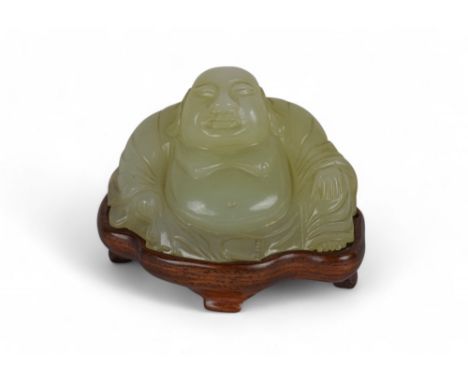 Chinese Late Qing Dynasty A seated jade Buddha on a later wooden stand  Property of a&nbsp;gentleman From the collection of P