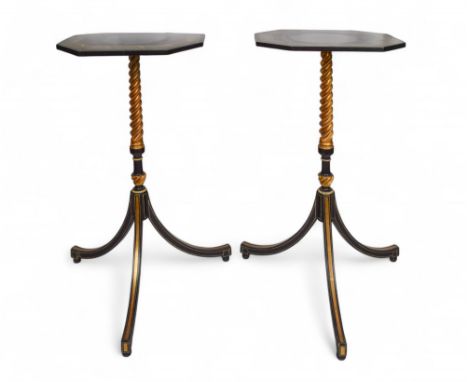 English Regency An elegant pair of ebonised and giltwood tripod occasional tables The painted tops decorated with intertwined