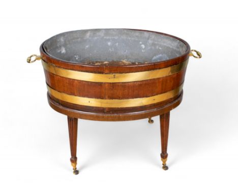 Georgian A brass bound basin, on stand, with fluted legs and casters Mahogany and brass  Dimensions: 22 in. (H) x 27 in. (W)