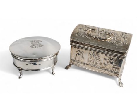 A silver embossed casket and a silver felt-lined jewellery box The casket hallmarked indistinctly, the jewellery box hallmark